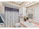 Clean bathroom with shower/tub combo and updated vanity at 2928 Bristol Ln, South Daytona, FL 32119