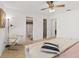 Bedroom with window, ceiling fan, en-suite bathroom and closet at 2928 Bristol Ln, South Daytona, FL 32119