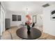 Dining area with round table and transparent chairs near living room at 2928 Bristol Ln, South Daytona, FL 32119