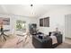 Living room with access to the backyard and modern decor at 2928 Bristol Ln, South Daytona, FL 32119