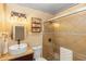 Modern bathroom with walk-in shower, contemporary fixtures, and unique light fixtures at 331 Sheldon St, New Smyrna Beach, FL 32168