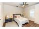 Cozy bedroom with a comfortable bed, stylish decor, and wood-look flooring at 331 Sheldon St, New Smyrna Beach, FL 32168