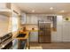 Kitchen with stainless steel appliances, light blue shaker cabinets, and wood countertops at 331 Sheldon St, New Smyrna Beach, FL 32168