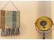 Close-up of wall decor and a stylish gold lamp in the living area at 331 Sheldon St, New Smyrna Beach, FL 32168