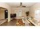 Bright living room with a large TV, comfortable seating, and natural light at 331 Sheldon St, New Smyrna Beach, FL 32168