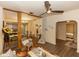 Open-concept living area with wood floors, a ceiling fan, and stylish furniture at 331 Sheldon St, New Smyrna Beach, FL 32168
