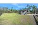 Small wooden barn in the backyard at 3782 Pine Cone Ln, Ormond Beach, FL 32174