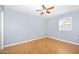 Bright bedroom featuring light walls and wood flooring at 3782 Pine Cone Ln, Ormond Beach, FL 32174