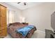 Cozy bedroom with a queen-size bed and built-in wardrobe at 3782 Pine Cone Ln, Ormond Beach, FL 32174