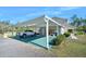 Covered carport area next to the house at 3782 Pine Cone Ln, Ormond Beach, FL 32174