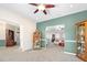 Common area with an open concept design and access to other rooms at 3782 Pine Cone Ln, Ormond Beach, FL 32174