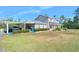 Two-story house with covered carport at 3782 Pine Cone Ln, Ormond Beach, FL 32174