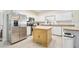 Kitchen with island and stainless steel appliances at 3782 Pine Cone Ln, Ormond Beach, FL 32174