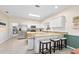 Spacious kitchen with an island, stainless steel appliances, and ample counter space at 3782 Pine Cone Ln, Ormond Beach, FL 32174
