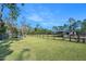 Fenced pasture with a small barn in the background at 3782 Pine Cone Ln, Ormond Beach, FL 32174