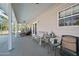 Covered porch with seating area at 3782 Pine Cone Ln, Ormond Beach, FL 32174