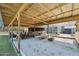 Open-air storage with various tools and equipment at 3782 Pine Cone Ln, Ormond Beach, FL 32174