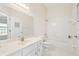 Clean bathroom with white tile, a shower/tub combo, and a single vanity at 4619 Barnacle Dr, Port Orange, FL 32127