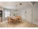 Dining area with light wood table and chairs at 572 Sherwood Oaks Rd, Orange City, FL 32763