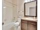 Clean bathroom with updated vanity and tile shower at 704 Ostrich Fern Ln, Deland, FL 32720