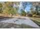 Large backyard with concrete slab and wooden fence at 711 S Pearl St, Deland, FL 32720