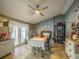 Bright dining room with fireplace and built-in shelving at 902 Millenbeck Ave, Deltona, FL 32725