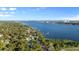 Aerial view of waterfront homes and cityscape at 1146 Riverside Dr, Daytona Beach, FL 32117