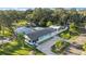 Aerial view of a charming light teal house at 1146 Riverside Dr, Daytona Beach, FL 32117