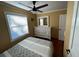 Cozy bedroom with a dresser and ceiling fan at 1146 Riverside Dr, Daytona Beach, FL 32117