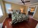Spacious bedroom with hardwood floors and access to an office at 1146 Riverside Dr, Daytona Beach, FL 32117