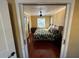 Main bedroom with a king-size bed and hardwood floors at 1146 Riverside Dr, Daytona Beach, FL 32117