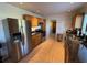 Updated kitchen with stainless steel appliances and granite counters at 1146 Riverside Dr, Daytona Beach, FL 32117