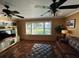 Living room with water views, comfortable seating and large windows at 1146 Riverside Dr, Daytona Beach, FL 32117