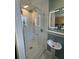 Walk-in shower with subway tile and glass enclosure at 1146 Riverside Dr, Daytona Beach, FL 32117
