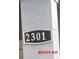 House number 2301 displayed on a plaque at 2301 9Th Ave, Deland, FL 32724