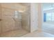Walk-in shower with glass enclosure and grab bar at 277 Cyan Ave, Daytona Beach, FL 32124