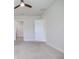 Bright bedroom with neutral walls and ceiling fan at 277 Cyan Ave, Daytona Beach, FL 32124