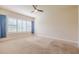 Spacious bedroom with carpeted floor and large windows at 277 Cyan Ave, Daytona Beach, FL 32124