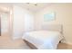 Well-lit bedroom with carpeted floor and ceiling fan at 277 Cyan Ave, Daytona Beach, FL 32124