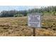 Sign designating a natural conservation area at 277 Cyan Ave, Daytona Beach, FL 32124