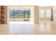 Dining room with view of screened patio and backyard at 277 Cyan Ave, Daytona Beach, FL 32124