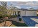Attractive single-story house with a two-car garage and landscaped front yard at 277 Cyan Ave, Daytona Beach, FL 32124