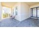 Small front porch with seating and paver flooring at 277 Cyan Ave, Daytona Beach, FL 32124