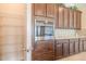 Walk-in pantry with wire shelving; adjacent to kitchen at 277 Cyan Ave, Daytona Beach, FL 32124