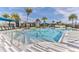 Resort-style pool with lounge chairs and palm trees at 277 Cyan Ave, Daytona Beach, FL 32124