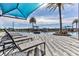 Relaxing pool area with lounge chairs and shade umbrellas at 277 Cyan Ave, Daytona Beach, FL 32124