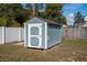 A detached storage shed in the backyard at 3182 Overdale St, Deltona, FL 32738