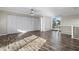 Large bedroom with wood-look floors, multiple closets, and a loft-like feel at 3603 Surfside Ter, Port Orange, FL 32127