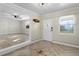 Bright entryway with herringbone floors and a barn door at 3603 Surfside Ter, Port Orange, FL 32127