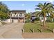 Two-story house with modern updates, a large yard, and a detached garage at 3603 Surfside Ter, Port Orange, FL 32127